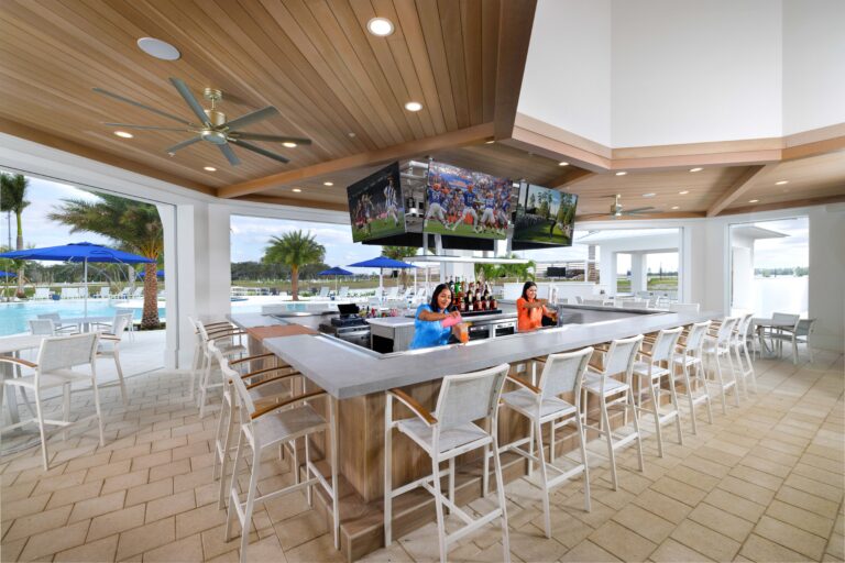 Flip Flops poolside bar with cocktails and TVs at Olde Florida RV resort.