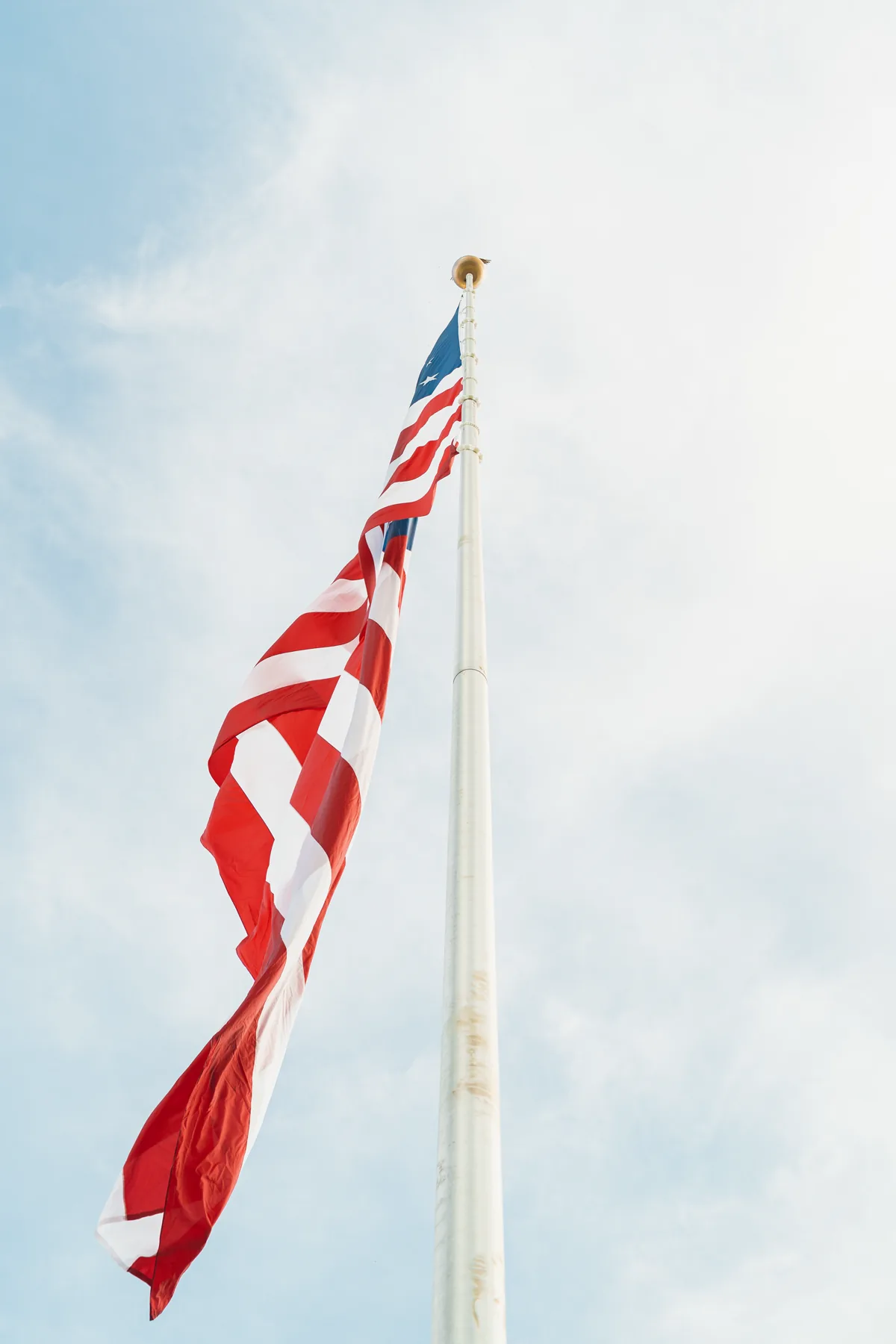 The American flag flying from the new 95-foot flagpole at Olde Florida Motorcoach and RV Resort